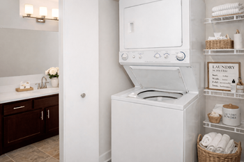 Stackable washer dryer unit in laundry alcove